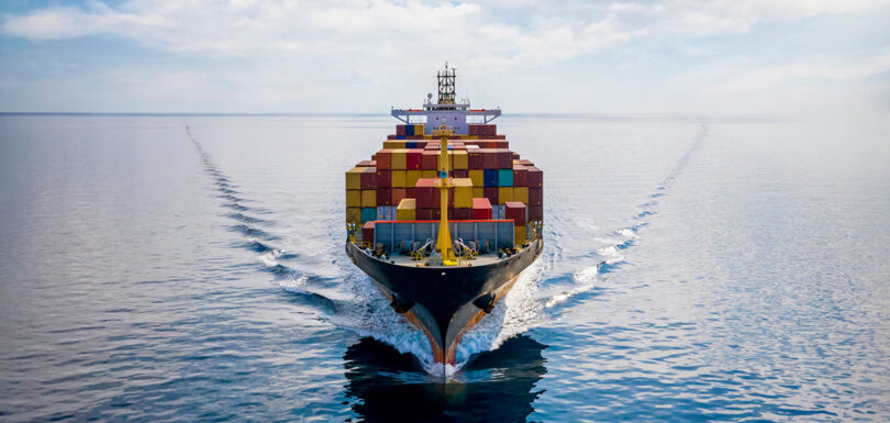 Ship in ocean loaded with containers