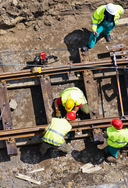 Aerial view of crew repairing railway section