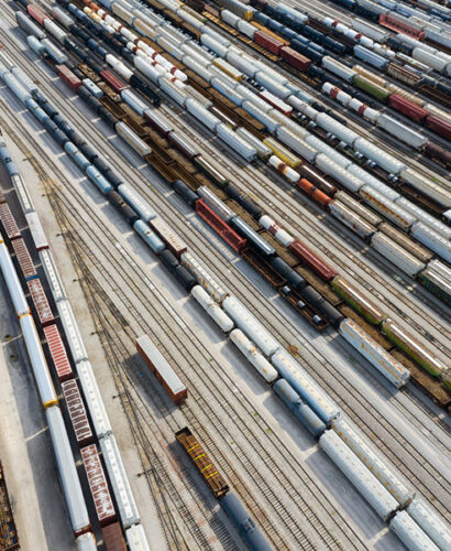 Aerial view of busy rail station.