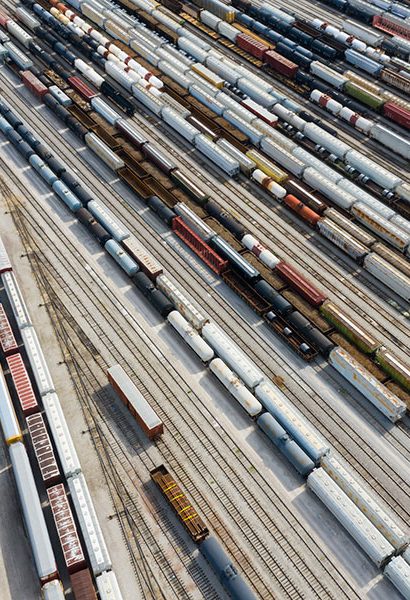 Aerial view of busy rail station.