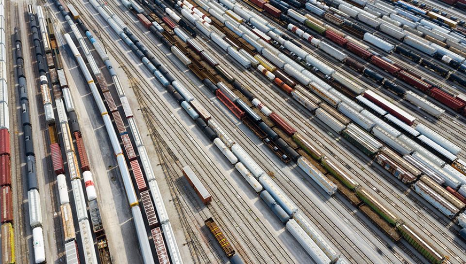 Aerial view of busy rail station.